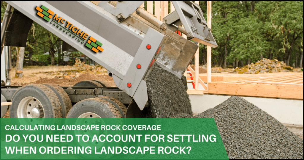 Landscape rock delivery truck at residential property